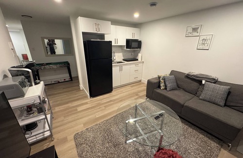 Dieppe House | Cozy Basement Apartment with Private Entrance and Office space-4 Mins to Airport