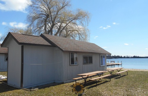 West Branch Cabin | Cozy Cabin at Water’s Edge: Sandy Beach, Kayaks, and Fun for the Whole Family