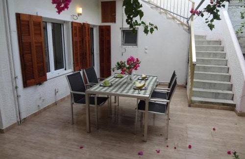 Ormos Korthiou House | Cozy Citrus Garden House by the Seaside.