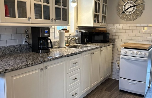 Breakwater Village Cottage | Cozy Cottage - Ocean Views- Steps away from private beach