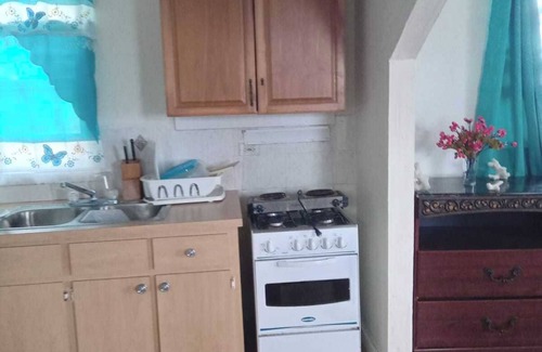 Andros Town House | Cozy cottage with AC, Washer & dryer, spacious, situated on the beach.