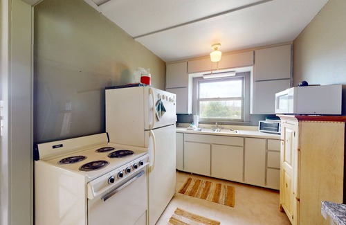 Arcadia Cottage | Cozy cottage with water views, spacious lawn, patio, & WiFi