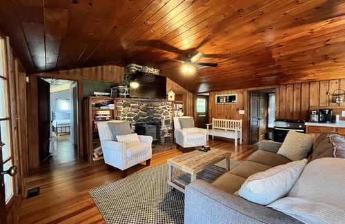 Weare Cottage | Cozy lakefront cottage with dock, close to skiing