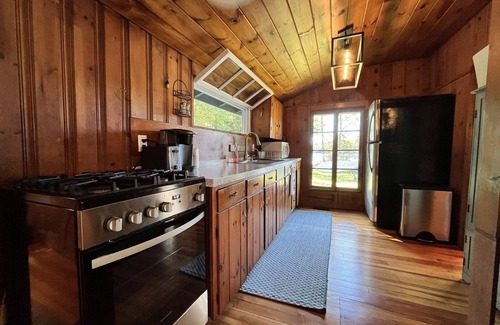 Weare Cottage | Cozy lakefront cottage with dock, close to skiing