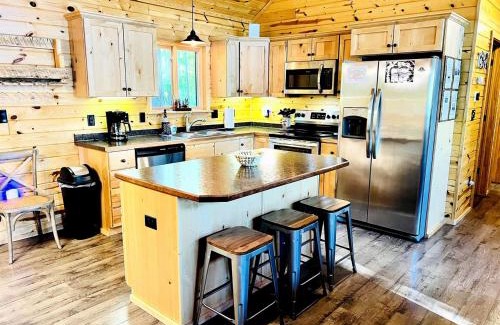 Stone Lake House | Cozy Lakefront Retreat with Game Room, Outdoor Living and Dock in Wisconsin