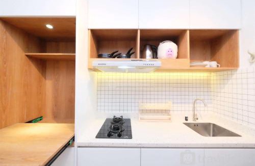 Tajur Halang Apartment | Cozy Living Studio Room Royal Sentul Park Apartment By Travelio