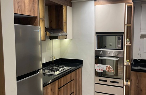 Sheraton Al Matar Apartment | Cozy Mivida Boulevard Flat Overlooking Pool