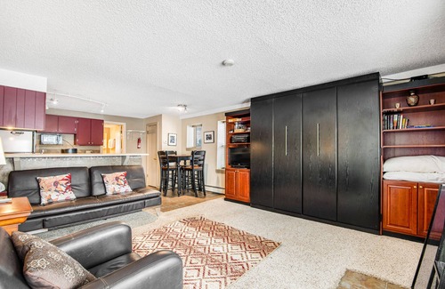 Wildernest Apartment | Cozy mountain view condo with patio - on bus route & great for skiing & boating