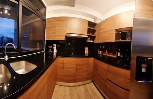 Zona 4 Condo | Cozy penthouse with a hot tub and an amazing view. 15 minutes from the airport.