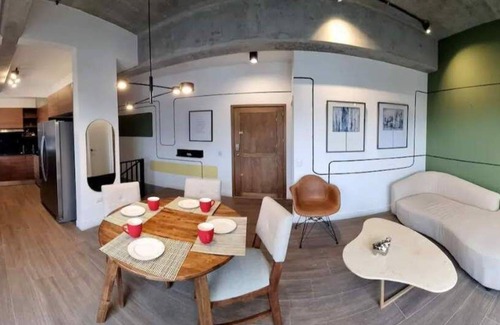 Zona 4 Condo | Cozy penthouse with a hot tub and an amazing view. 15 minutes from the airport.