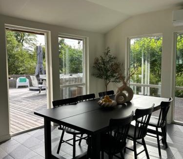 Hjarnarp Villa | Cozy Retreat with Modern Charm