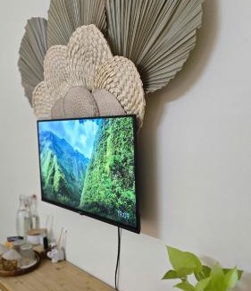 District 1 Apartment | Cozy Room Featuring Local Rattan & Bamboo