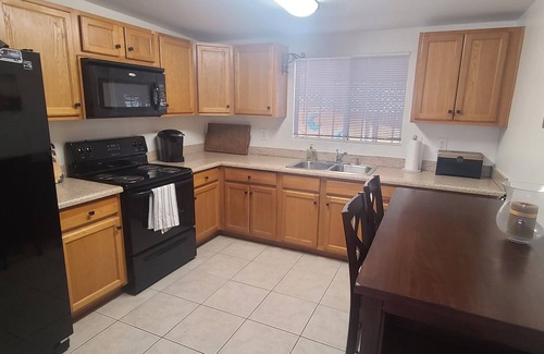 Apache Junction House | Cozy spanish style bungalow; huge private covered patio includes spa and more!