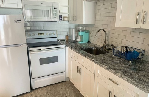 Sand Key Apartment | Cozy studio condo with beachview and shared pool, hot tub, & tennis courts