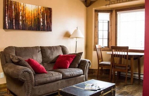 Estes Park Cabin | Cozy Suite with fireplace and Jacuzzi tub . Dogs OK.