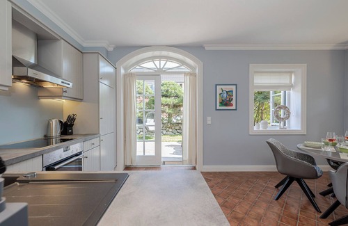 Archsum Apartment | Cozy thatched-roof vacation apartment "Likedeeler" on Sylt with terrace & parking space