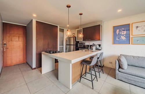 Las Lomas I Apartment | Cozy Unit with Unbeatable View in a Prime Location w/pool