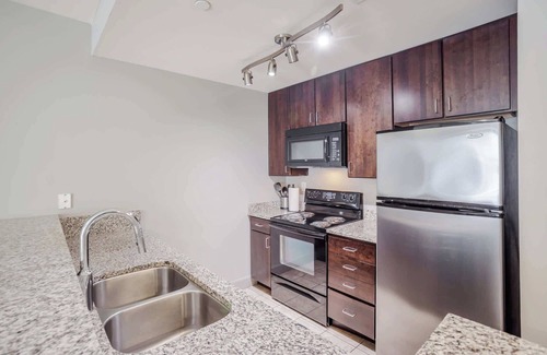 Central Business District Apartment | CozySuites - Current at the Banks