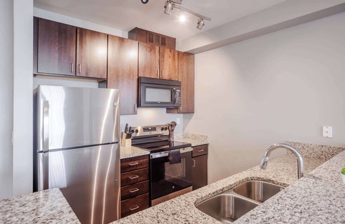Central Business District Apartment | CozySuites - Current at the Banks