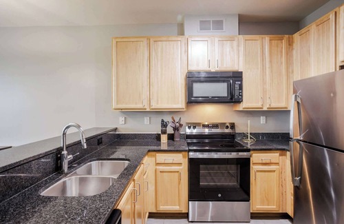 Central Business District Apartment | CozySuites - Current at the Banks