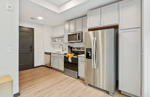 Lockerbie Square Apartment | CozySuites Mass w/parking, lounge & roof deck #14