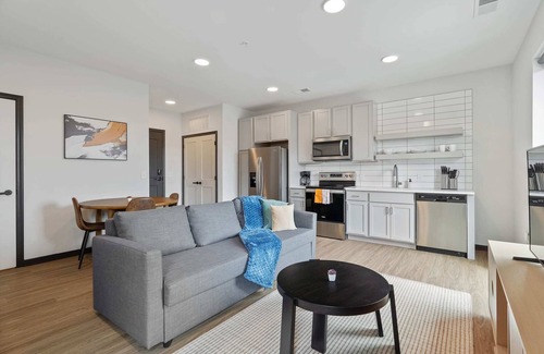 Lockerbie Square Apartment | CozySuites Mass with parking, lounge and roof deck 8