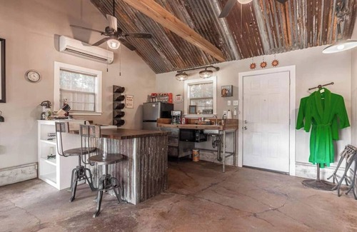 Waco House | Creatively colorful and cozy cabin and Airstream on the Brazos!