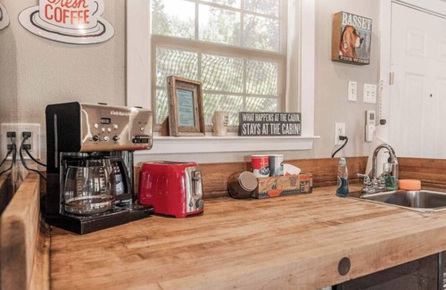 Waco House | Creatively colorful and cozy cabin and Airstream on the Brazos!
