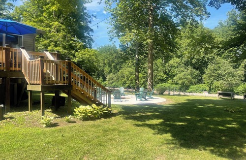 Montoursville House | Creekfront getaway with hot tub and fire pit.
