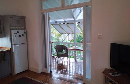 Hastings Apartment | Crotona Garden 2 Bed Apt, Lush and Tropical with Pool. 2 Minutes Walk to Sea