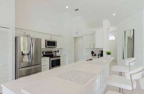 Crown Pointe House | Crown Pointe- Covered Lanai w/TV-Heated South Facing Pool, Newly Renovated home w/3 king beds!