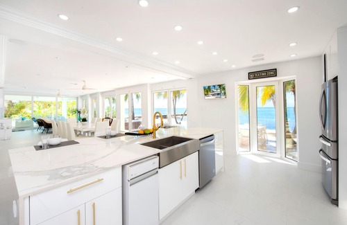 Rum Point House | Crystal Waters: Luxe Villa w/Private Pool, Dock and Barefoot Beach Lounge - Walk to The Kaibo!
