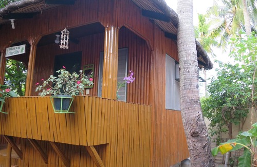 Roxas Cottage | Cute, cool Green Kubo near the beach