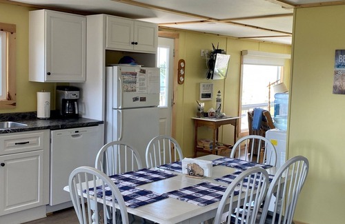 Victoria Cottage | Cute cottage with water view. Steps to a red sand beach on the South Shore.