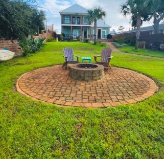 Holiday Beach House | Dancin on the Waves On Lagoon Boat dock, Pool, Firepit