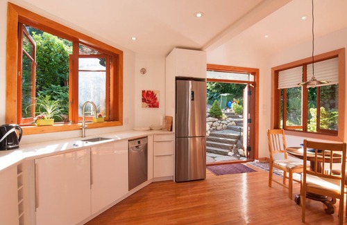 District of North Vancouver Cottage | Deep Cove Creekside, Ocean View Retreat