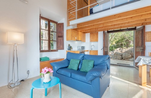 Deia Apartment | Deia tower overlooking the sea and it famous cove.