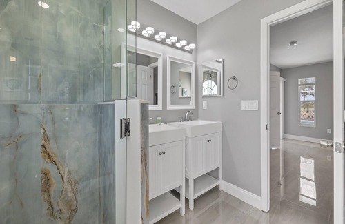 Pelican House | Deja Blue Villa | Canal Front + Screened-In Private Heated Pool