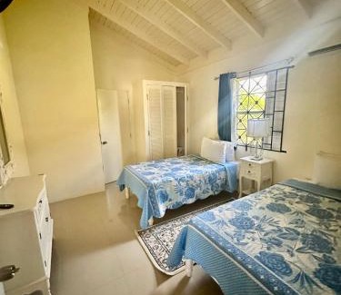 Mammee Bay Apartment | Dell's Exotic Haven, 2 bedrooms, 2 baths, pool, gym