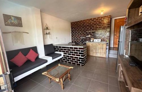 Las Pocitas Apartment | Departamento con vista al mar y piscina compartida