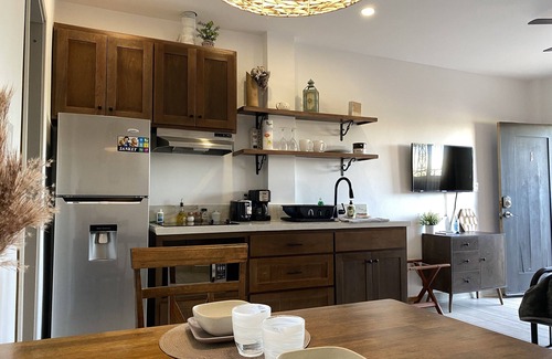 Belize City Apartment | Designer Chic Suite with Patio - Fully Stocked for Your Stay