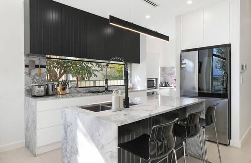 Caringbah South Apartment | Designer Family Retreat with Pool Next to Cronulla