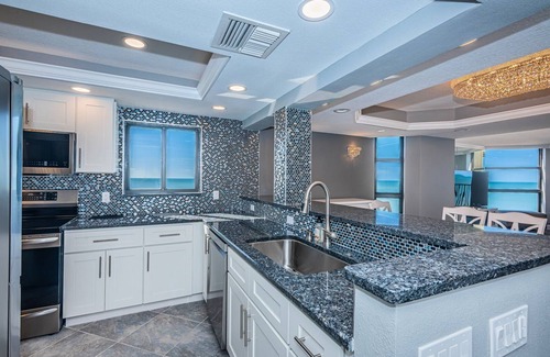 Sand Key Condo | Direct Gulf Front Southern Exposure corner unit with TWO BALCONIES!.