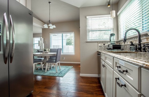 Wells Branch House | Discerning Ranch-Style Home with Grassy Backyard