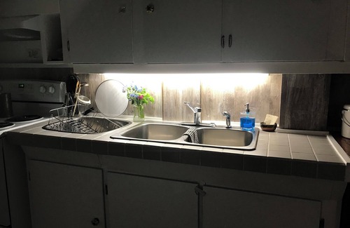 Queen Charlotte Apartment | Dockside Daajing Giids , eclectic and laid back island style.
