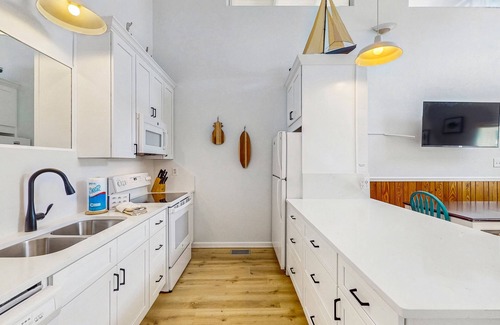 St. George Island Condo | Dog-friendly Condo with a Shared Pool, Great Beach Vibes, & Stunning Views