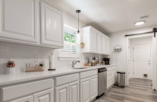 Bella Vista House | Dog-friendly home with wooded views, fireplace, W/D & classic front porch