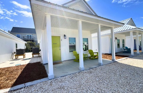 Port St. Joe Cottage | "Dolphin Cottage" is a pet friendly, 2 bed, 1 1/2 bath unit accepting 5 guests. Community Pool.