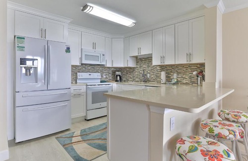 Holiday Isle House | Dolphin Point 402C - 2BR Updated Condo with Harbor and Gulf Views
