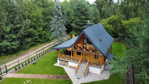 Radzymin Ski Chalet | Domek góralski